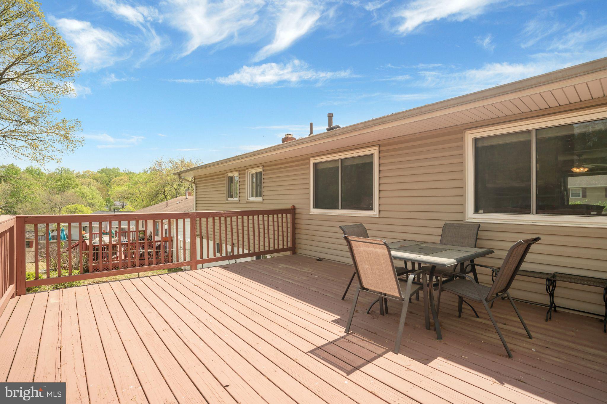 4552 Kinmount Road Lanham, MD 20706 - Photo 46 of 55 a view of a house with wooden deck