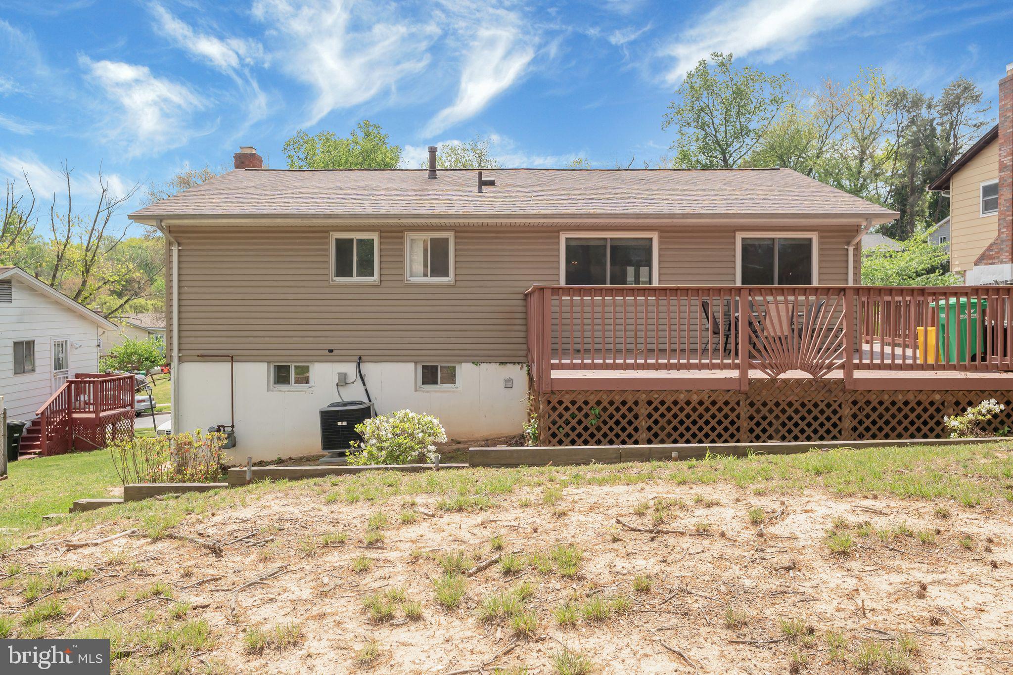 4552 Kinmount Road Lanham, MD 20706 - Photo 49 of 55 a front view of a house with a yard