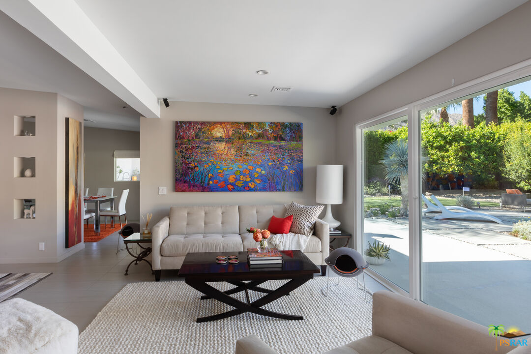 646 East Morongo Road Palm Springs, CA 92264 - Photo 11 of 45 a living room with furniture and a flat screen tv