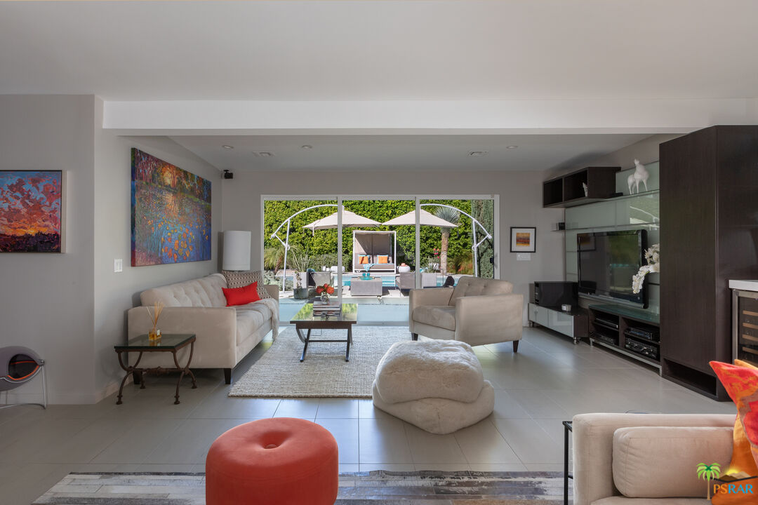 646 East Morongo Road Palm Springs, CA 92264 - Photo 12 of 45 a living room with furniture and a flat screen tv