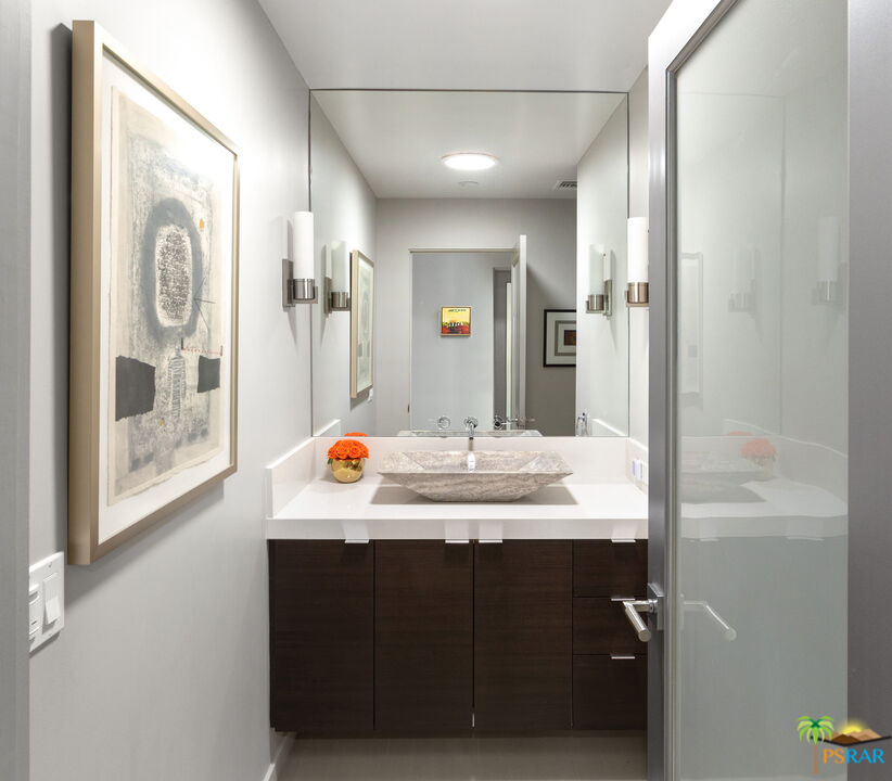 646 East Morongo Road Palm Springs, CA 92264 - Photo 16 of 45 a bathroom with a sink and a mirror