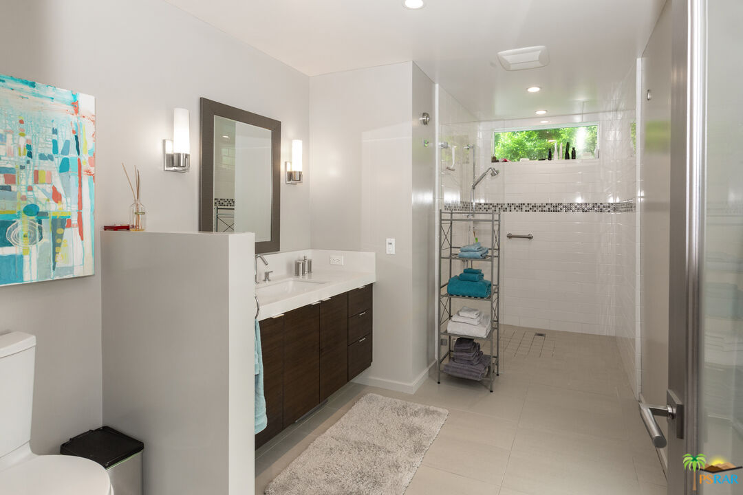 646 East Morongo Road Palm Springs, CA 92264 - Photo 20 of 45 a bathroom with a sink and a mirror