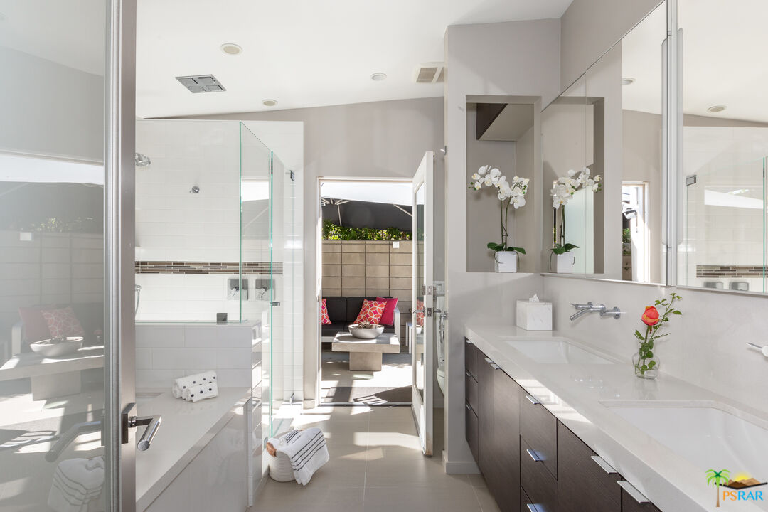 646 East Morongo Road Palm Springs, CA 92264 - Photo 23 of 45 a bathroom with a tub sink mirror and shower