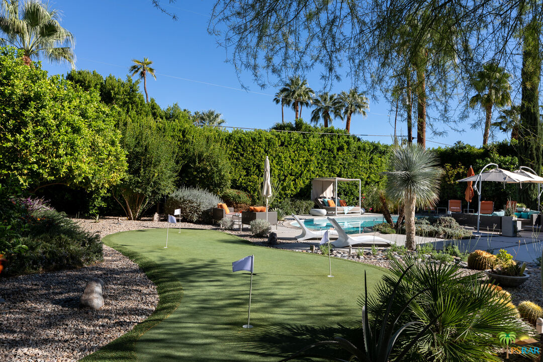 646 East Morongo Road Palm Springs, CA 92264 - Photo 30 of 45 a view of swimming pool with lawn chairs and plants