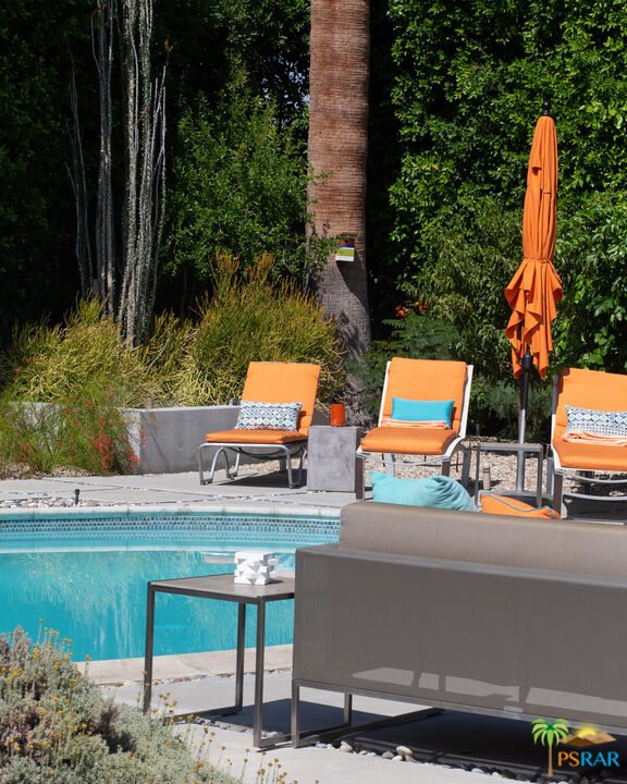 646 East Morongo Road Palm Springs, CA 92264 - Photo 31 of 45 an aerial view of a house with a garden and swimming pool