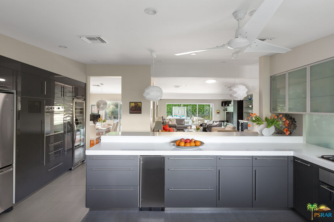 646 East Morongo Road Palm Springs, CA 92264 - Photo 7 of 45 a view of counter top space with stainless steel appliances lots of counter top space and windows