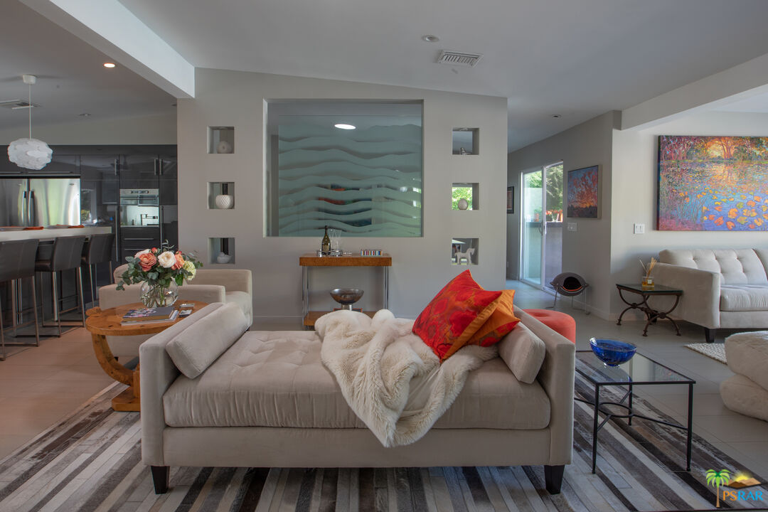 646 East Morongo Road Palm Springs, CA 92264 - Photo 10 of 45 a living room with furniture and a flat screen tv