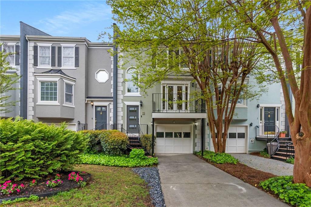 15 Sycamore Station Decatur, GA 30030 - Photo 1 of 1 a front view of a house with a garden