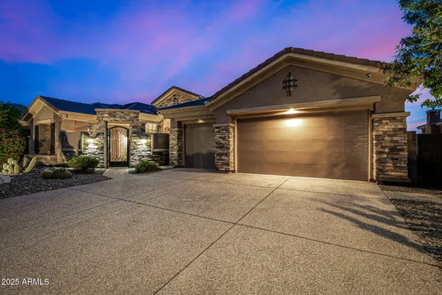 a kitchen with a refrigerator and cabinets