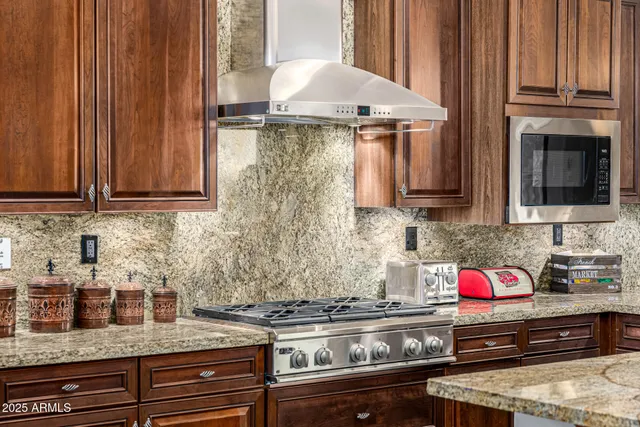 a view of a fountain in the middle of a lake