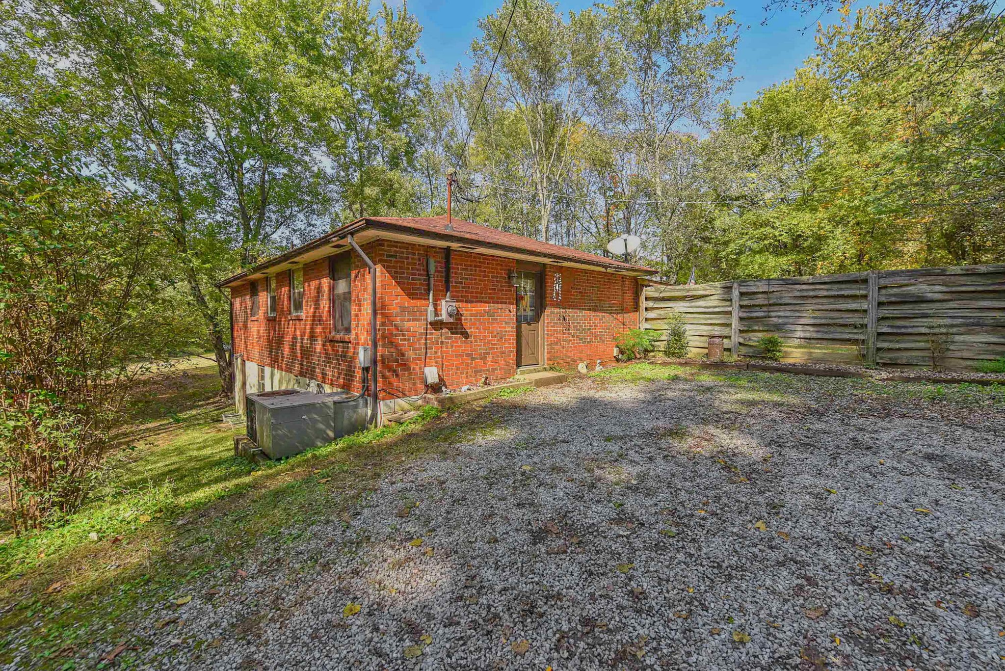 4601 Kinneys Road Springfield, TN 37172 - Photo 12 of 30 a view of backyard with wooden fence and large trees