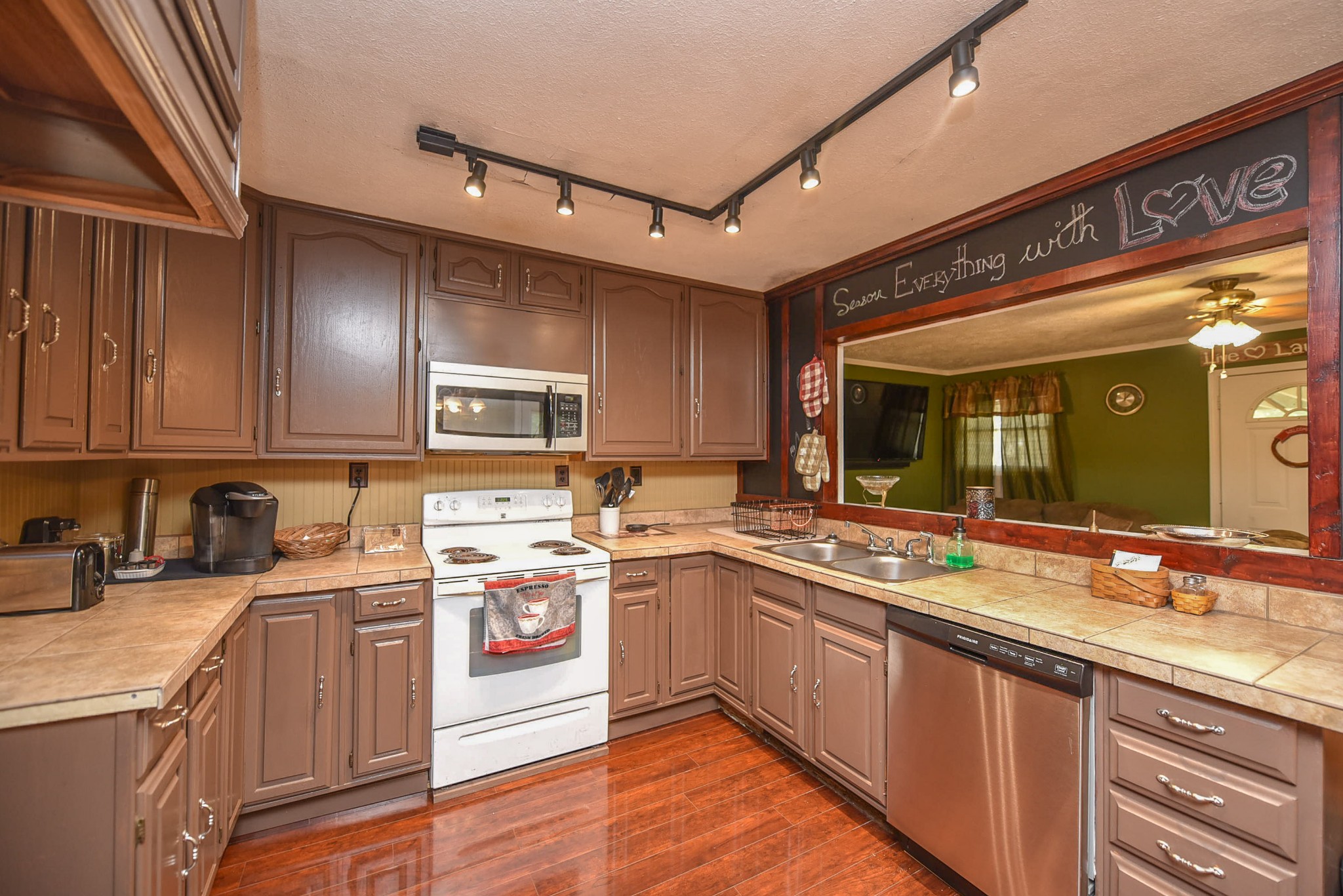 4601 Kinneys Road Springfield, TN 37172 - Photo 19 of 30 a kitchen with a sink stove and cabinets