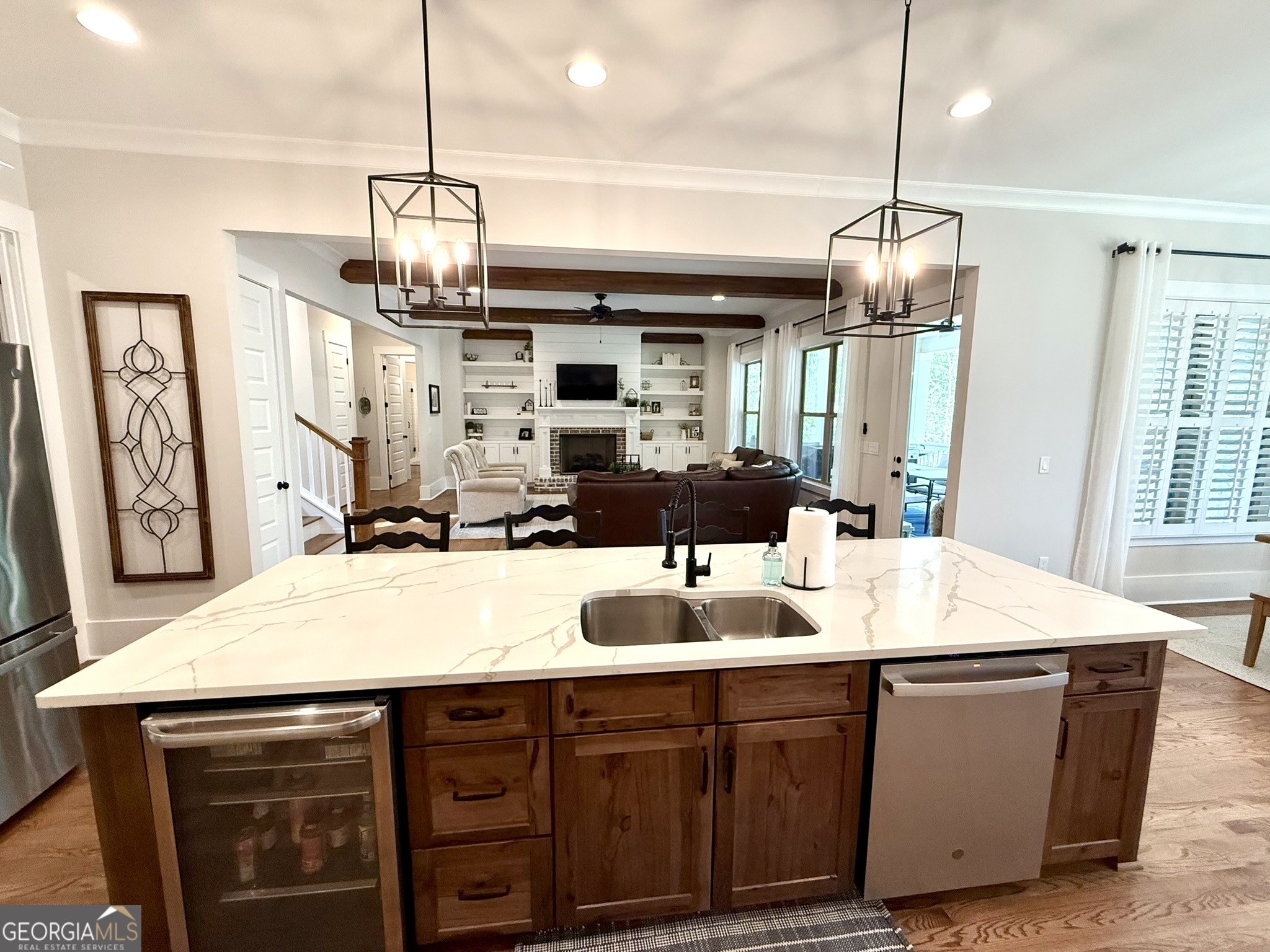 120 Spring Creek Drive Rutledge, GA 30663 - Photo 11 of 38 a kitchen with a table chairs and white cabinets