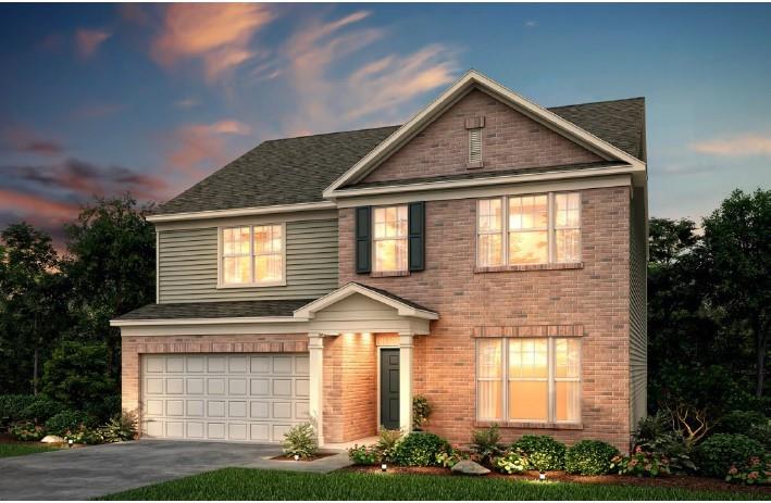 1746 Maston Road Auburn, GA 30011 - Photo 1 of 1 a front view of a house with garden