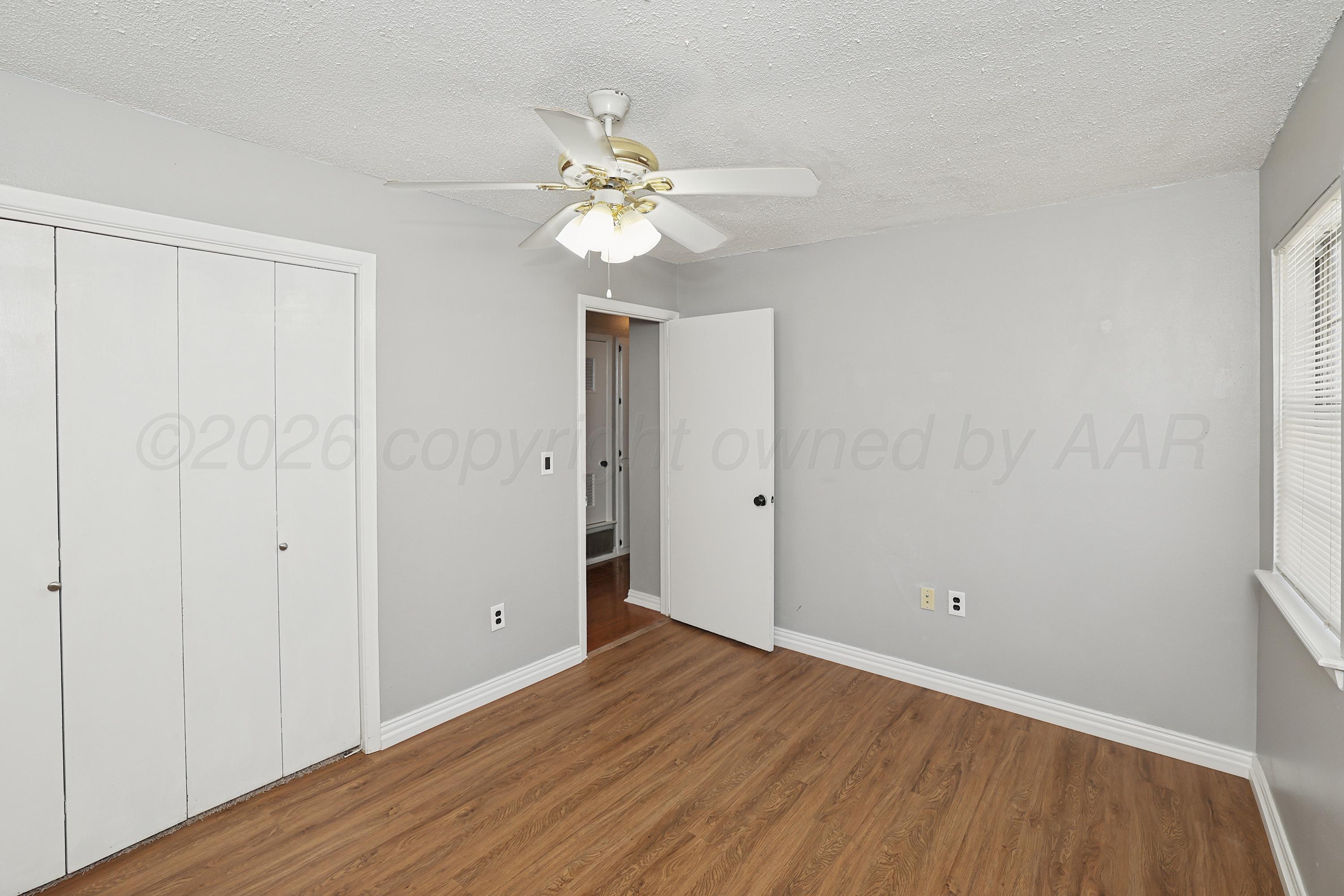 5142 Royce Drive Amarillo, TX 79110 - Photo 15 of 22 14-2nd Bedroom
