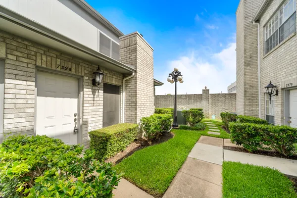 a view of a back yard of the house