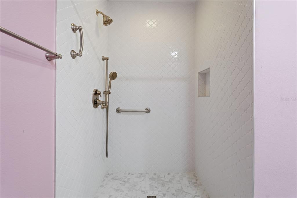 106 Hunter Court Palm Harbor, FL 34684 - Photo 11 of 21 a bathroom with a shower