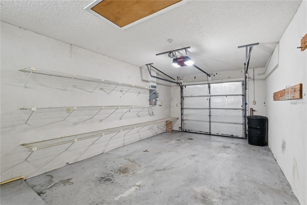 106 Hunter Court Palm Harbor, FL 34684 - Photo 15 of 21 a view of a garage