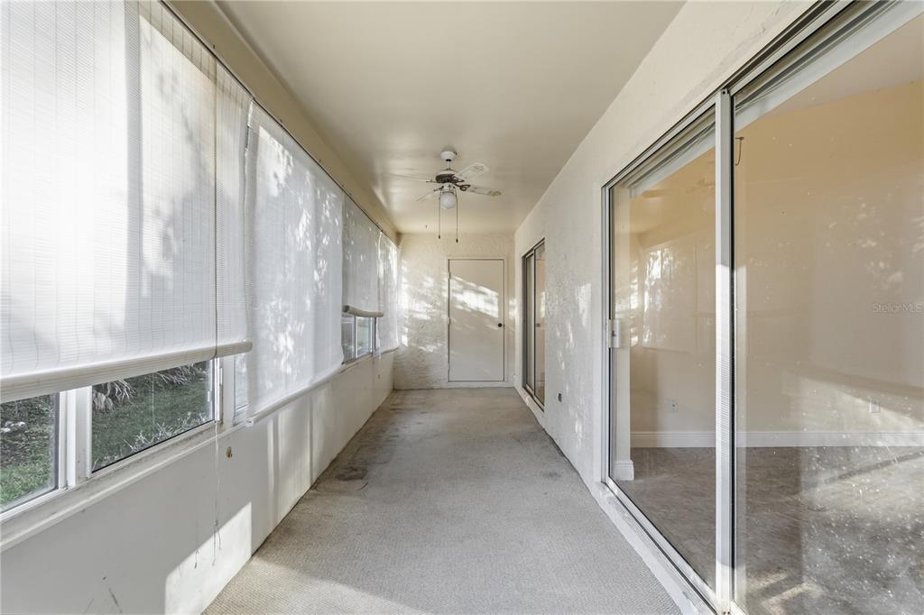 106 Hunter Court Palm Harbor, FL 34684 - Photo 17 of 21 a view of a hallway with windows
