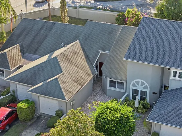 an aerial view of residential house with outdoor space
