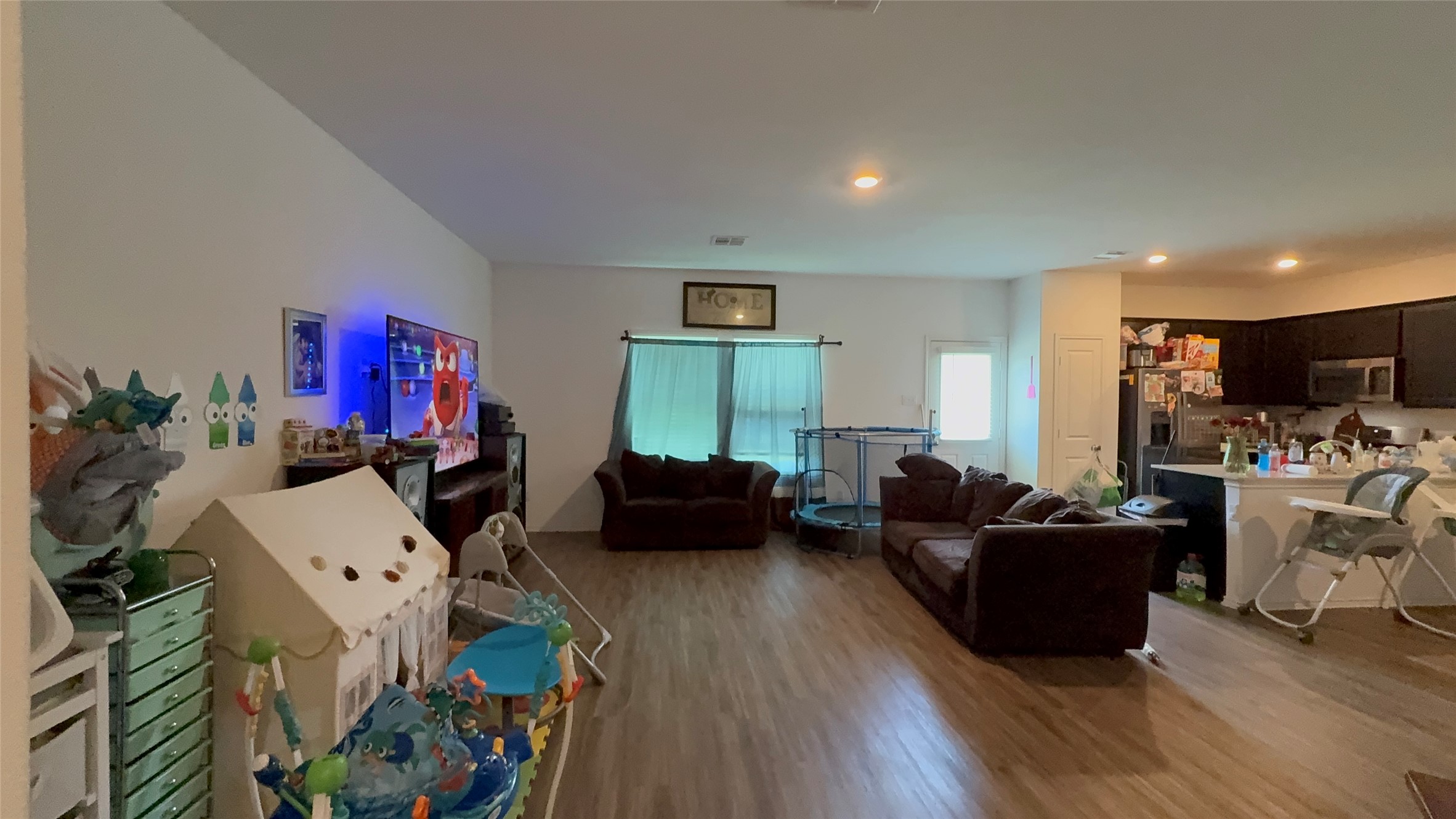 316 Geode Glen Maxwell, TX 78656 - Photo 2 of 24 a living room with furniture and a flat screen tv