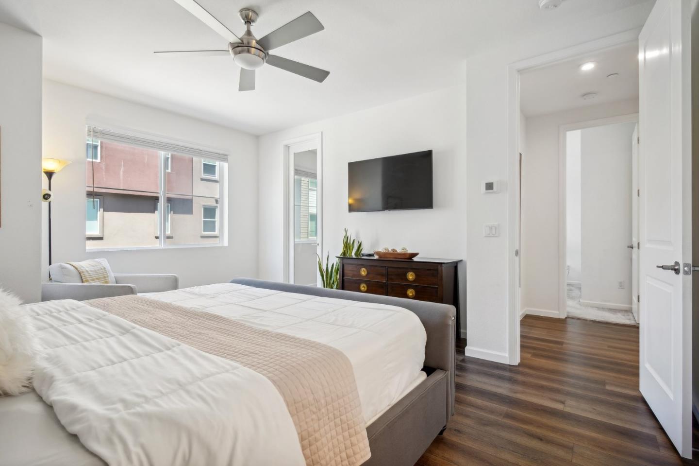 5461 Dublin Boulevard Dublin, CA 94568 - Photo 14 of 55 a bedroom with a bed and a flat screen tv