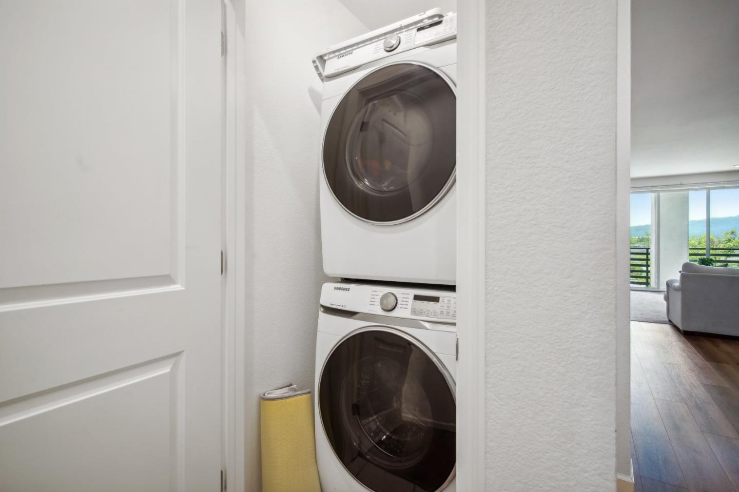 5461 Dublin Boulevard Dublin, CA 94568 - Photo 19 of 55 a view of a hallway with washer and dryer