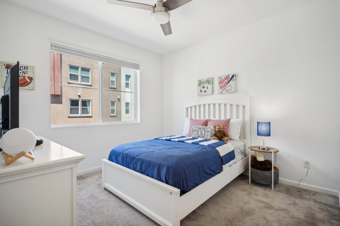 5461 Dublin Boulevard Dublin, CA 94568 - Photo 20 of 55 a bedroom with a bed and a window