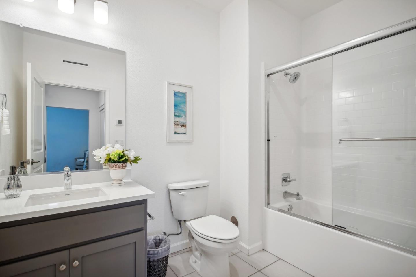 5461 Dublin Boulevard Dublin, CA 94568 - Photo 22 of 55 a bathroom with a sink toilet vanity and shower