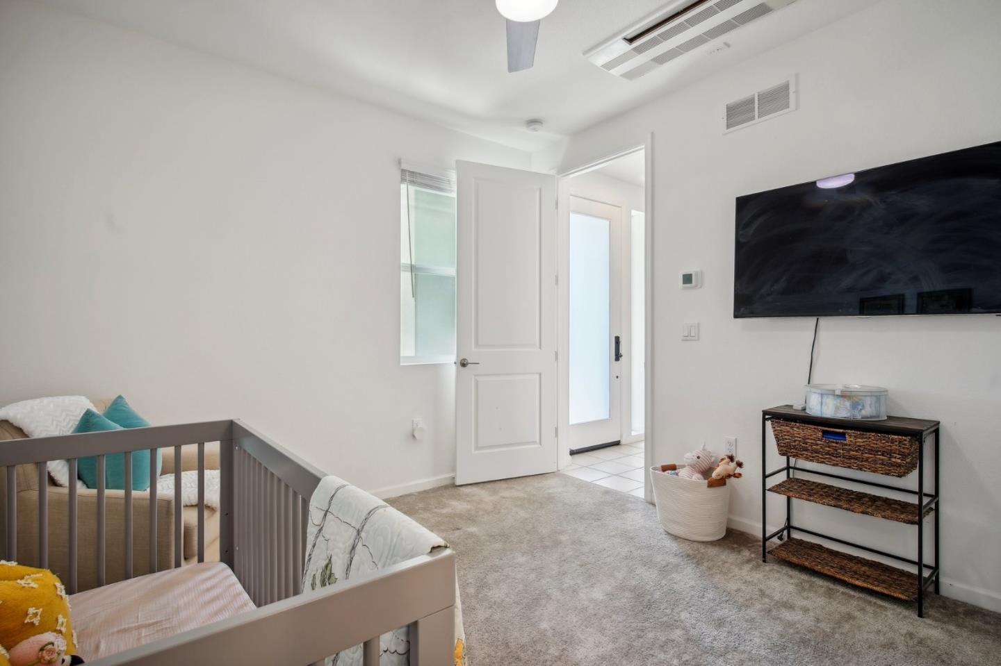 5461 Dublin Boulevard Dublin, CA 94568 - Photo 23 of 55 a living room with furniture and a flat screen tv