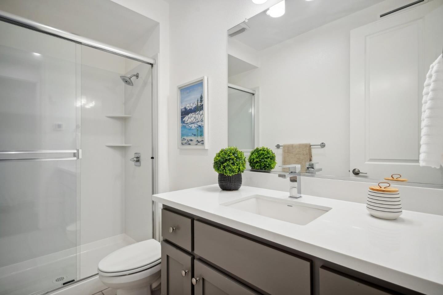 5461 Dublin Boulevard Dublin, CA 94568 - Photo 25 of 55 a bathroom with a sink a toilet and shower