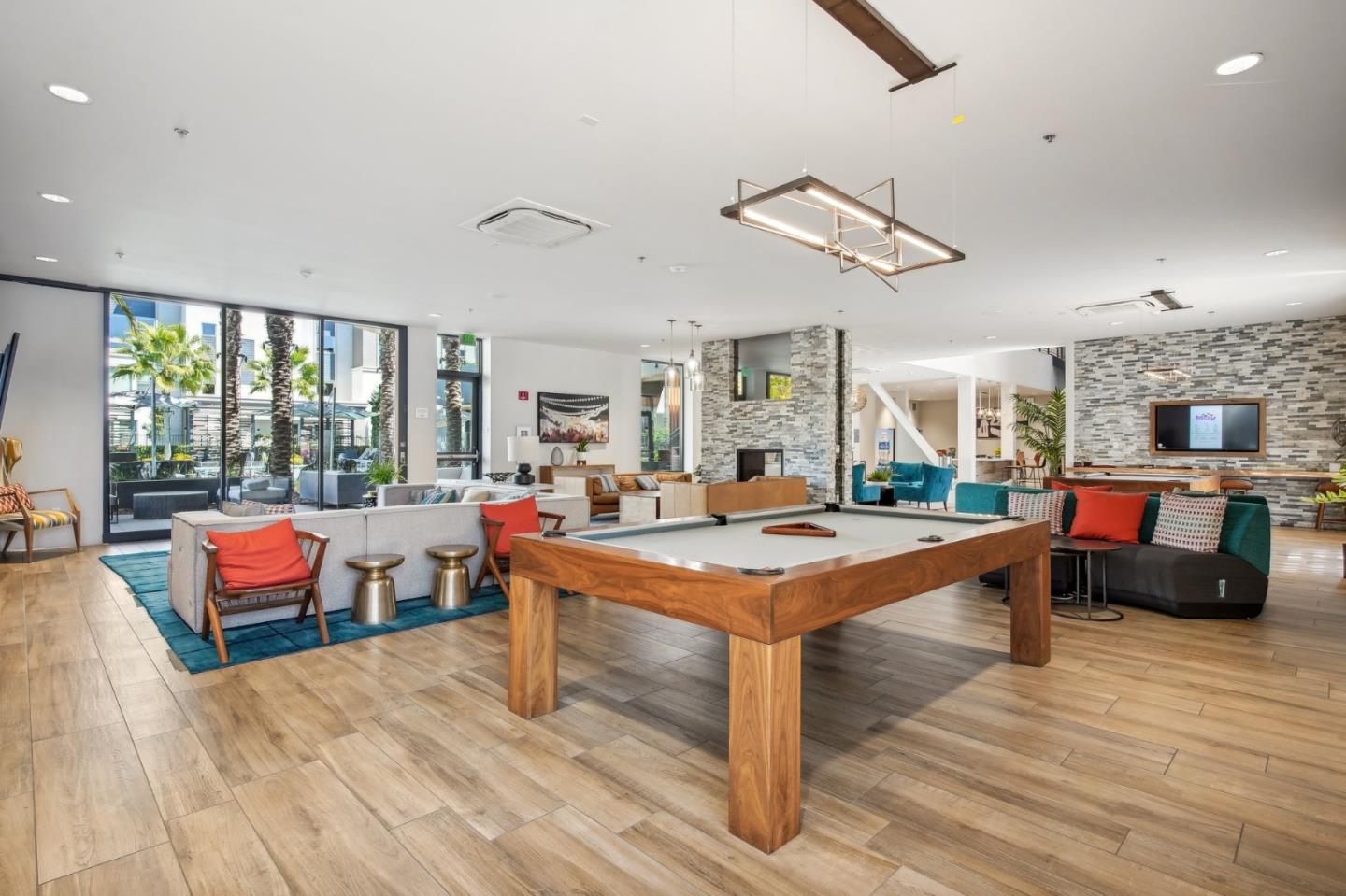 5461 Dublin Boulevard Dublin, CA 94568 - Photo 47 of 55 a room with furniture a rug potted plant and a large window