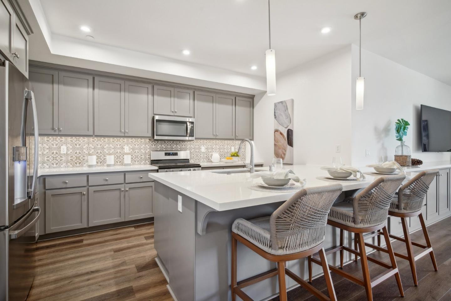 5461 Dublin Boulevard Dublin, CA 94568 - Photo 9 of 55 a kitchen with a sink microwave and cabinets