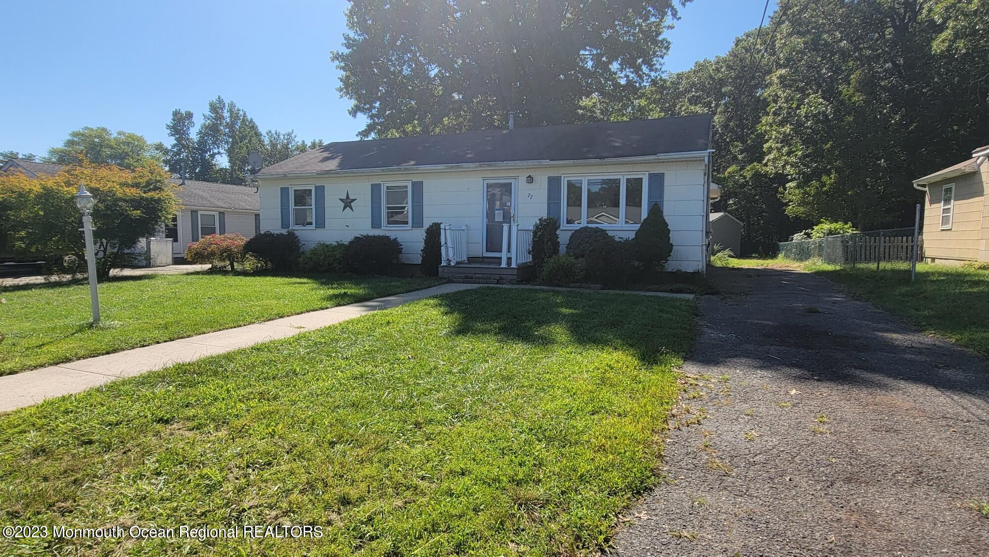 77 Smith Street Howell, NJ 07731 - Photo 2 of 15 a view of a yard in front of a house