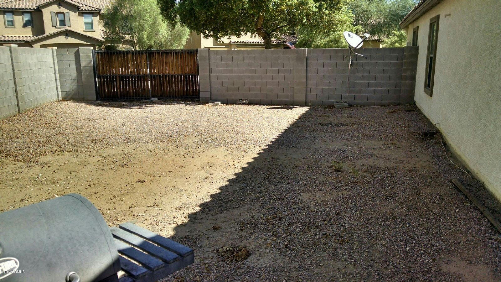 13555 West Watson Lane Surprise, AZ 85379 - Photo 2 of 21 a view of a backyard
