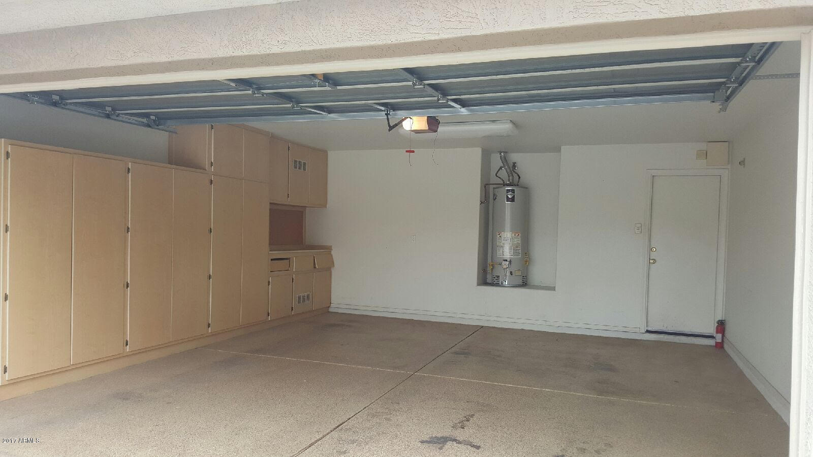 13555 West Watson Lane Surprise, AZ 85379 - Photo 4 of 21 a view of a garage