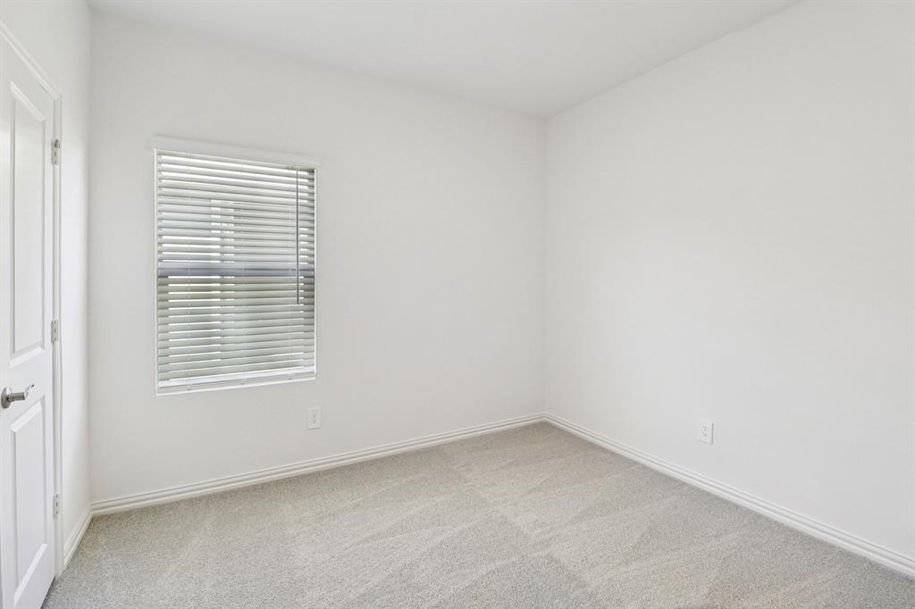1708 Arches Road Anna, TX 75409 - Photo 11 of 21 an empty room with a window