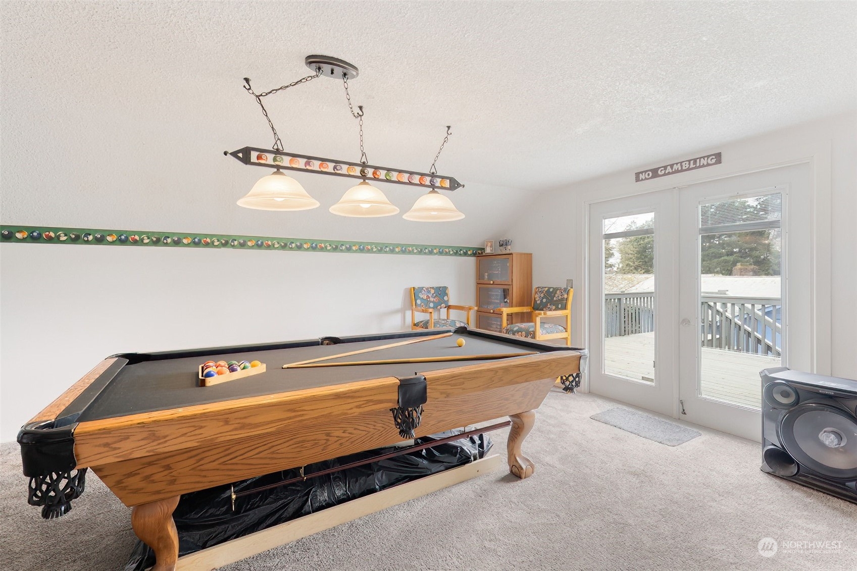 10 Lee Place Longview, WA 98632 - Photo 25 of 38 a room with table chairs and wooden floor