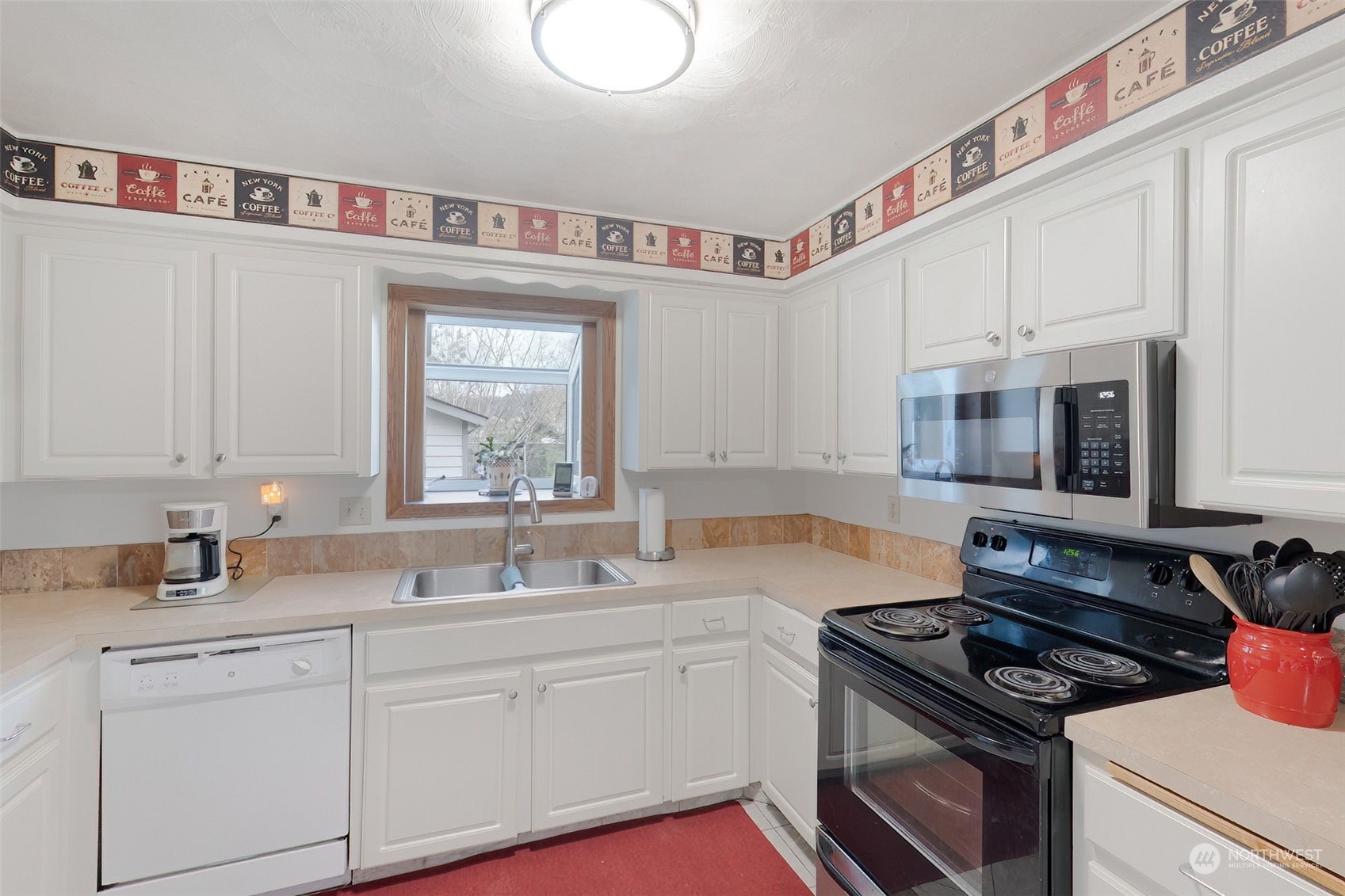 10 Lee Place Longview, WA 98632 - Photo 9 of 38 a kitchen that has a sink and a stove