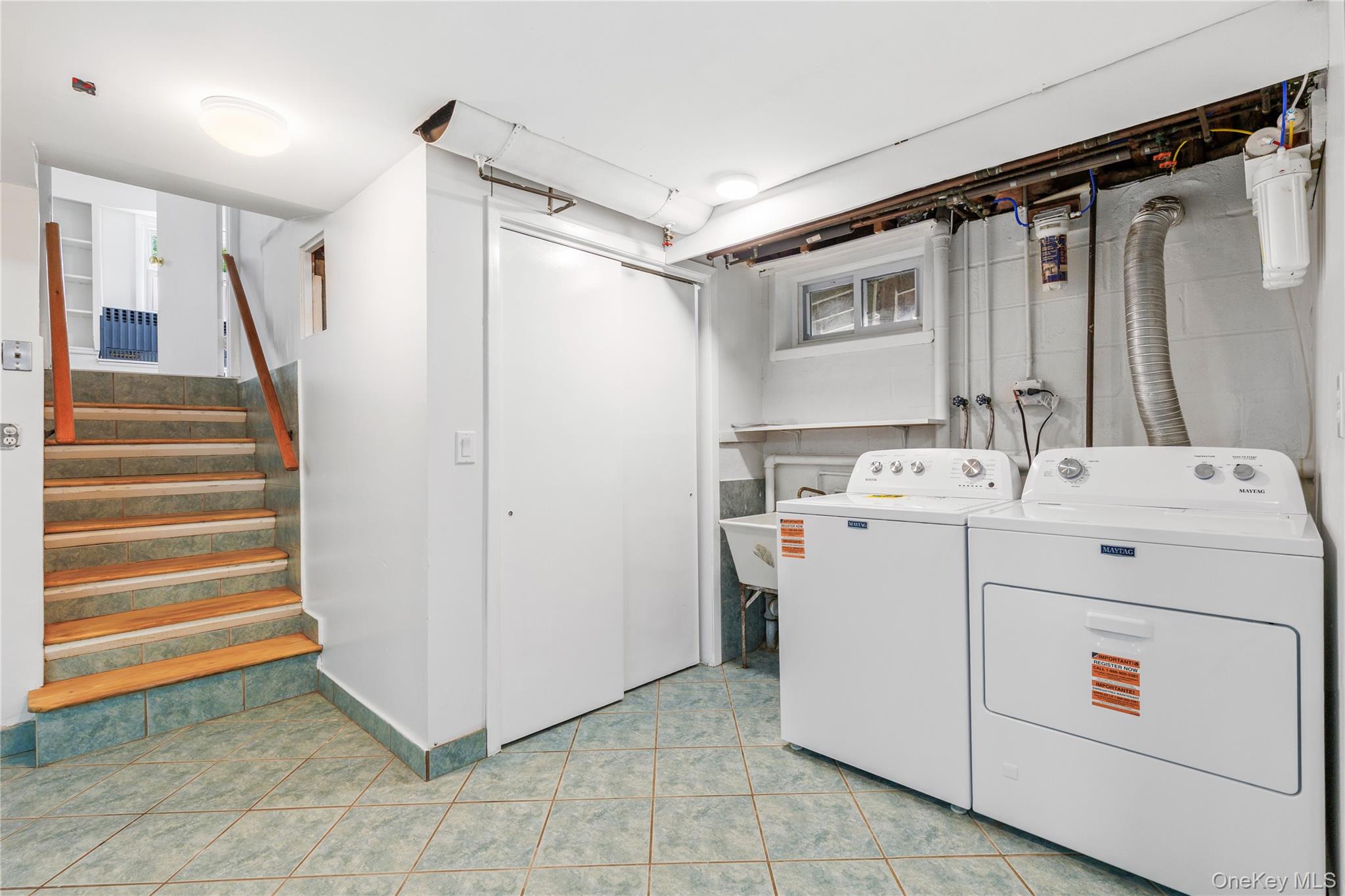 46 Mathews Street Harrison, NY 10528 - Photo 20 of 30 a utility room with dryer and washer
