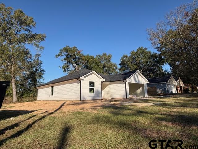 623 North Weldon Street Frankston, TX 75763 - Photo 14 of 29 a view of a house with a yard