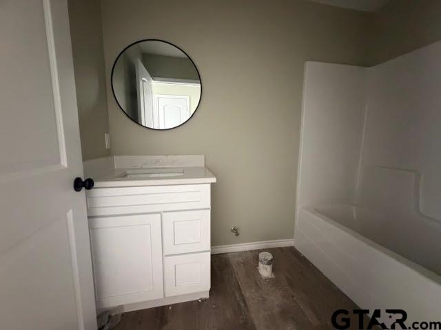 623 North Weldon Street Frankston, TX 75763 - Photo 25 of 29 a bathroom with a sink and a mirror