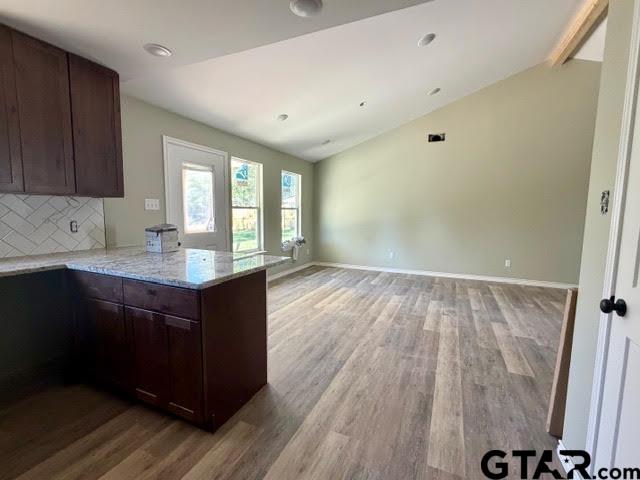 623 North Weldon Street Frankston, TX 75763 - Photo 28 of 29 a kitchen with wooden cabinets and sink