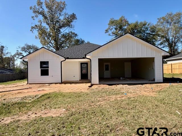 623 North Weldon Street Frankston, TX 75763 - Photo 8 of 29 a front view of a house with a yard and garage