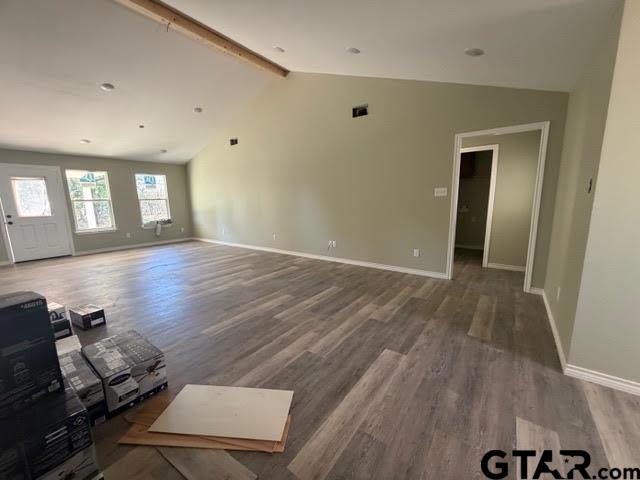 623 North Weldon Street Frankston, TX 75763 - Photo 9 of 29 wooden floor in an empty room with a window