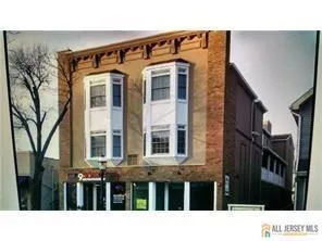 a lobby with furniture and window