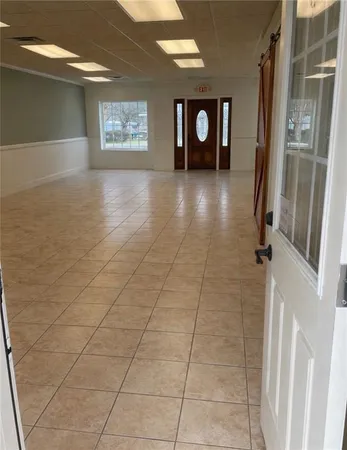 a view of an entryway with a door