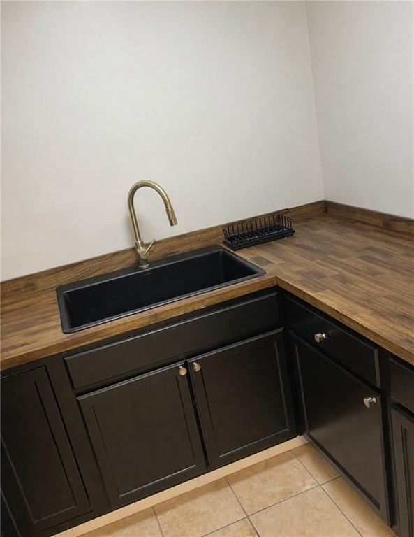 2676 Us-411 Highway Ranger, GA 30734 - Photo 7 of 9 a close view of a stove top oven and cabinets