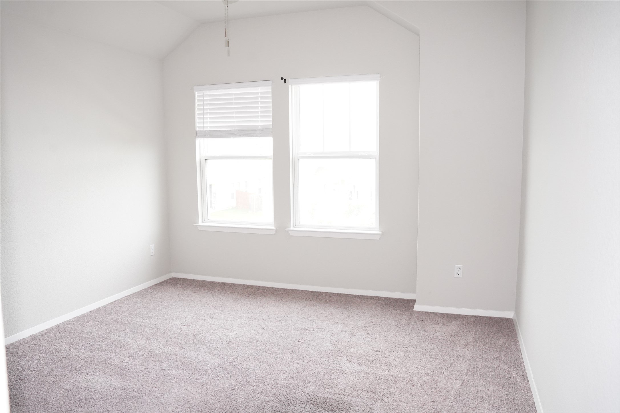 117 Crescent Street Georgetown, TX 78626 - Photo 28 of 38 A quiet retreat with a vaulted ceiling and ample light from two bright windows awaits.