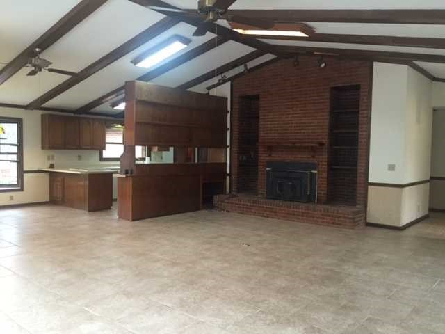 6875 Colaparchee Road, Unit 5A Macon, GA 31210 - Photo 22 of 39 a view of a kitchen with a refrigerator and a stove top oven